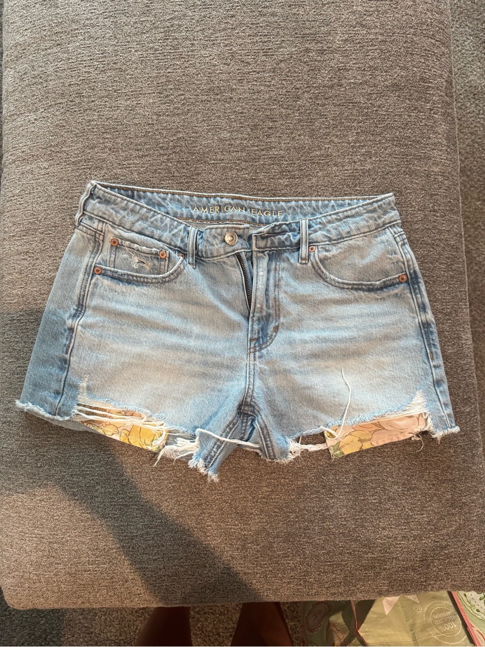 American Eagle Outfitters Light Blue Denim Cutoff Shorts with Floral Underlay